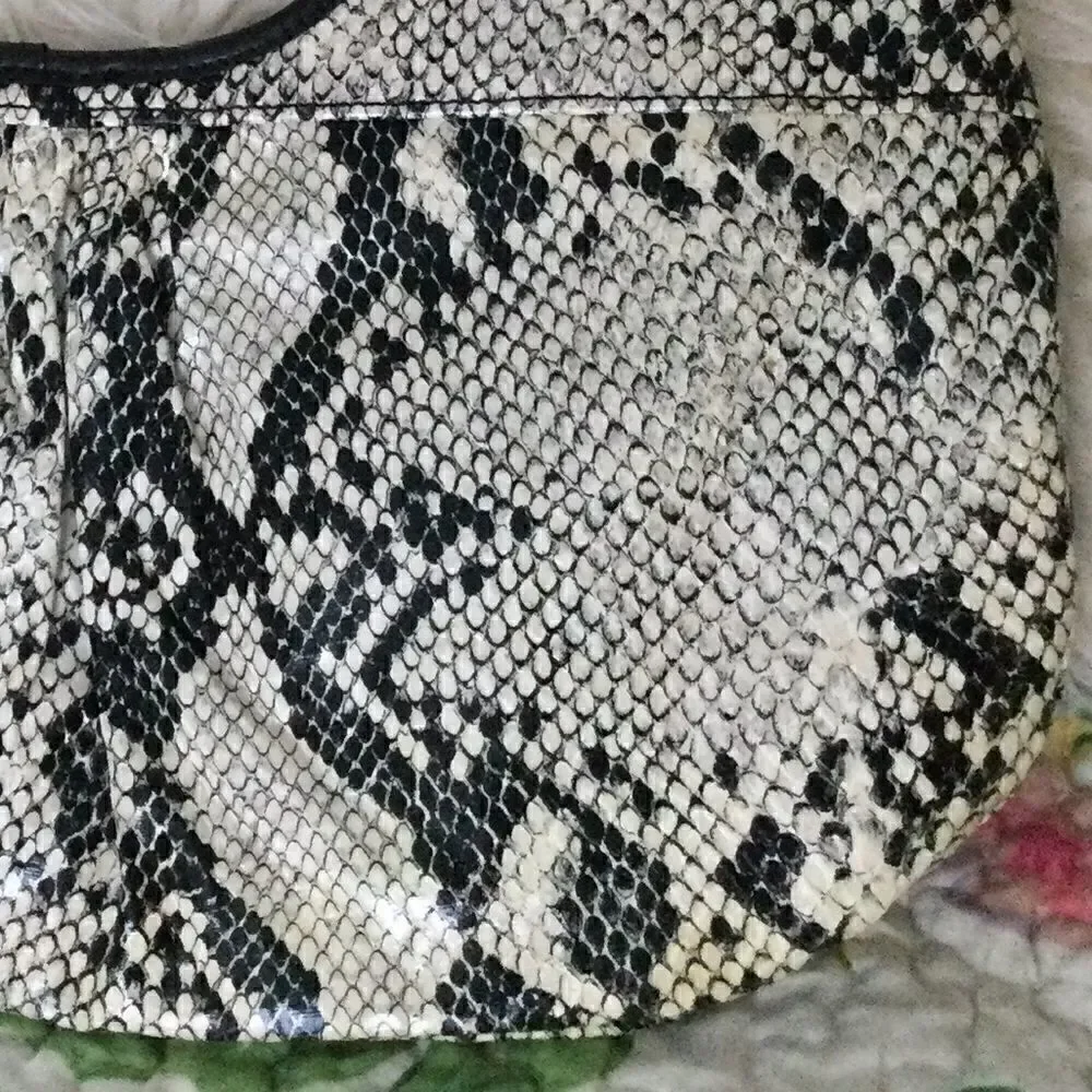 Carlos Falci clutch python look, vegan